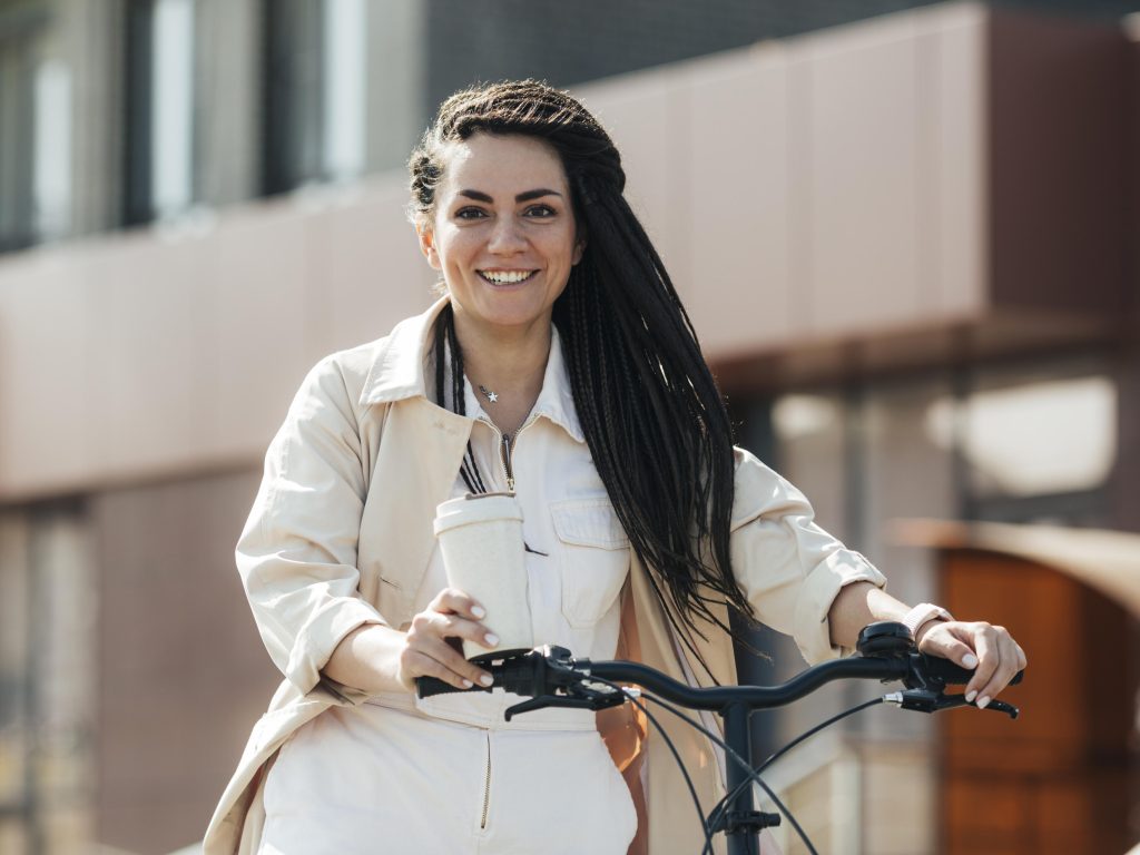 adult-woman-posing-with-eco-friendly-bicycle